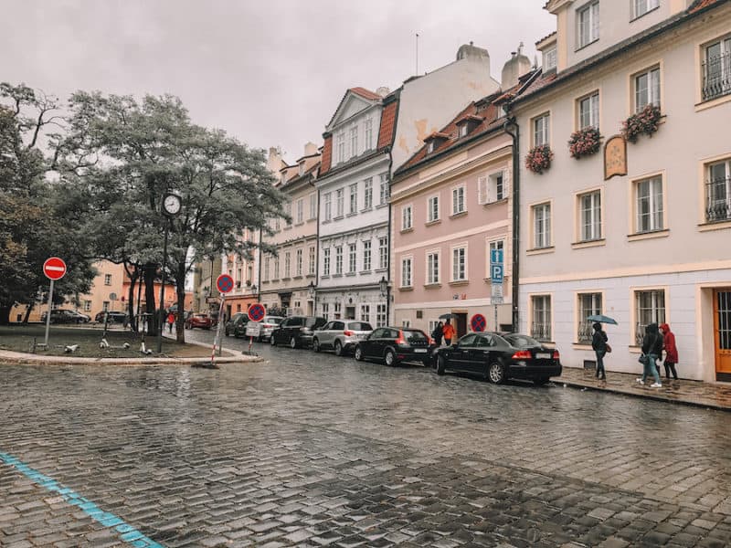 Rainy cobblestone street in Mala Strana