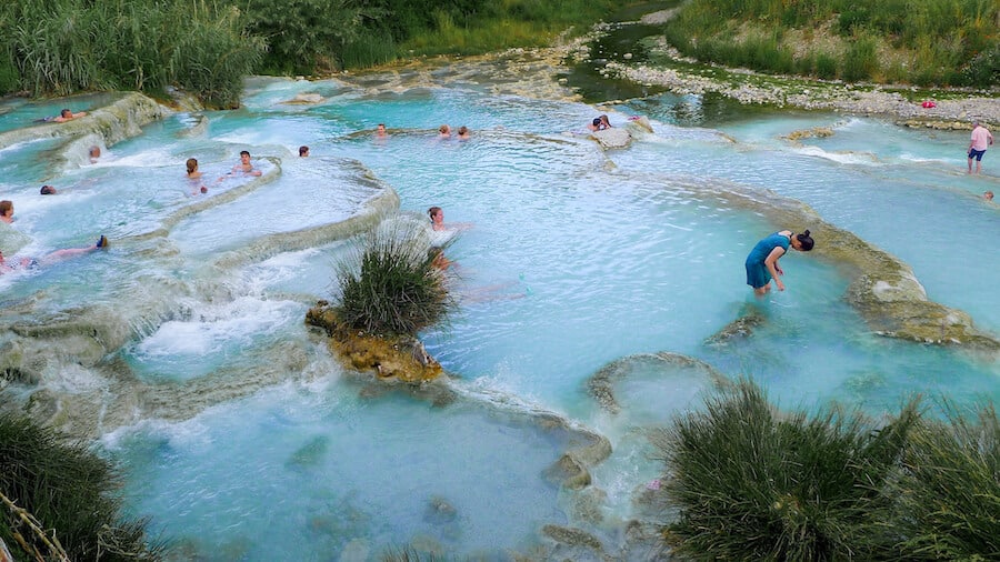 People swimming in the hot springs