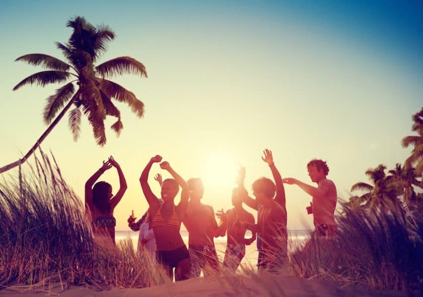 People dancing on the beach