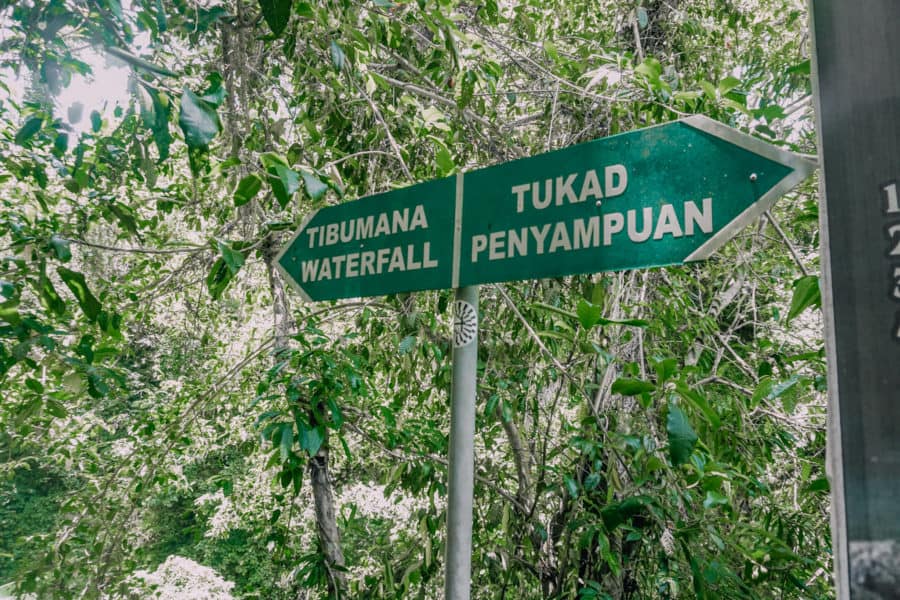 Sign directing to Tibumana waterfall