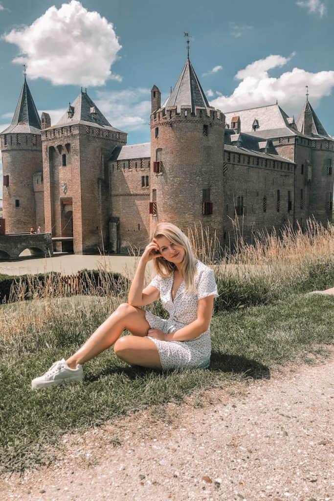 Castle with a girl infront of it
