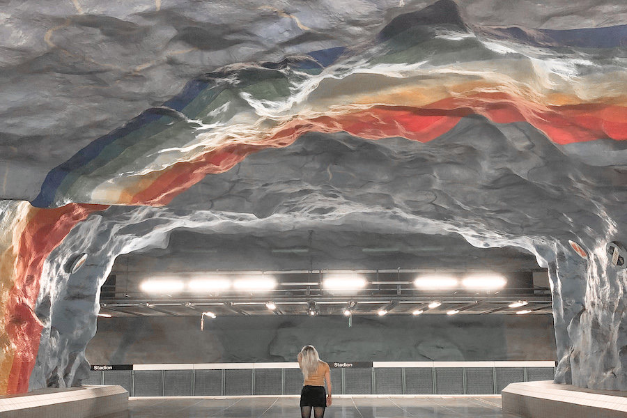 Stockholm subway art with rainbows painted onto the whole subway