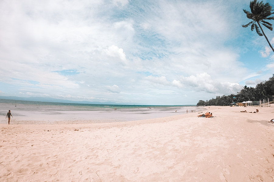 White sand beach and blue skies