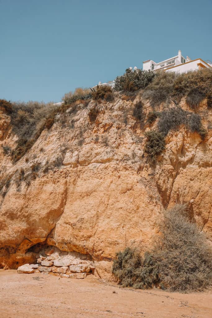 Huge golden colored rocks along the beach