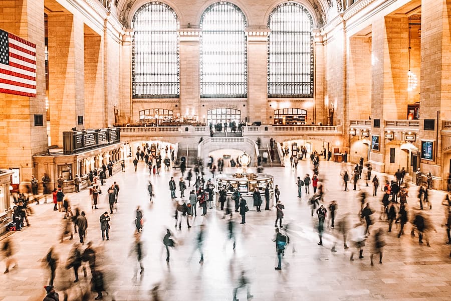 Bustling train station full of people