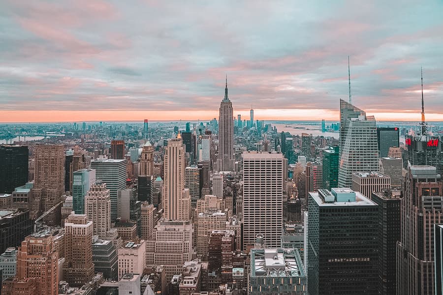 New York City skyline with a pink sunset