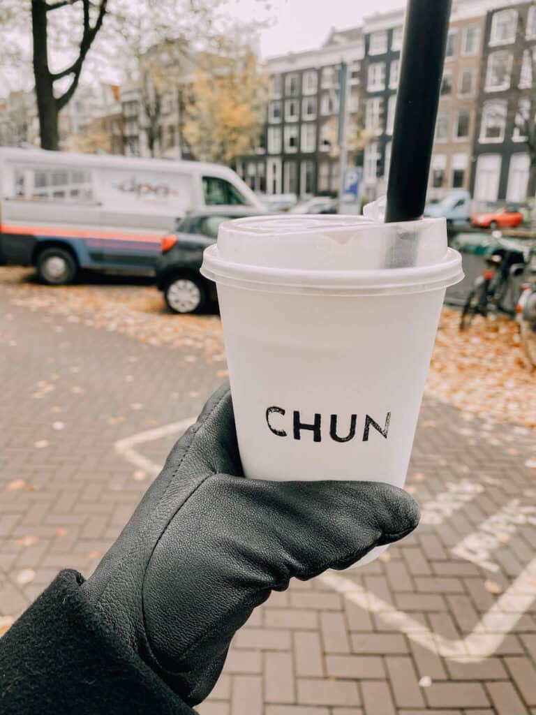 Bubble tea in a to o cup on the streets of Amsterdam