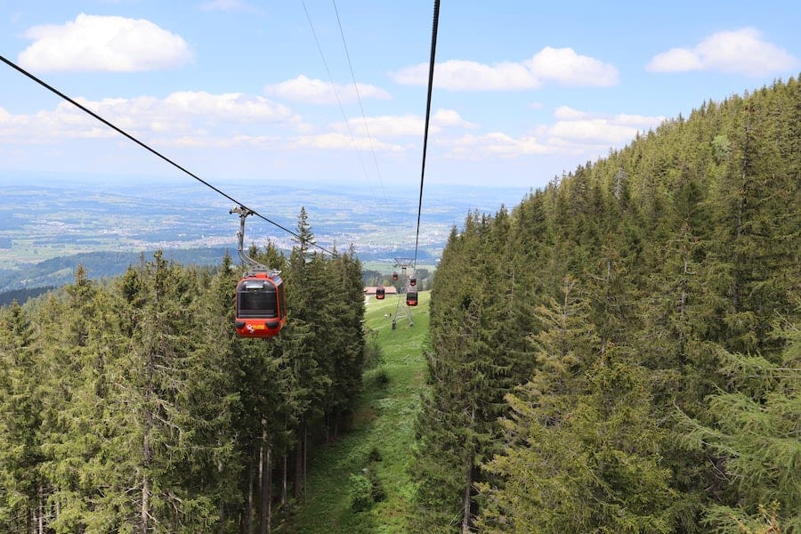 Cable cars going up a mountain