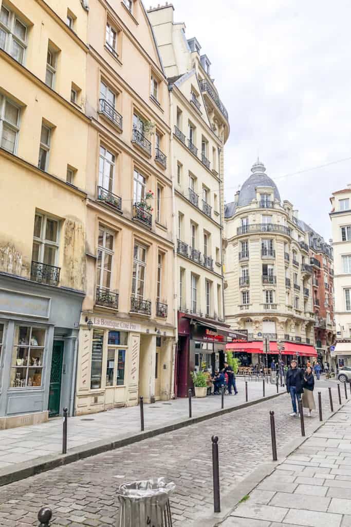 Street of Paris with yellow-tinted buildings