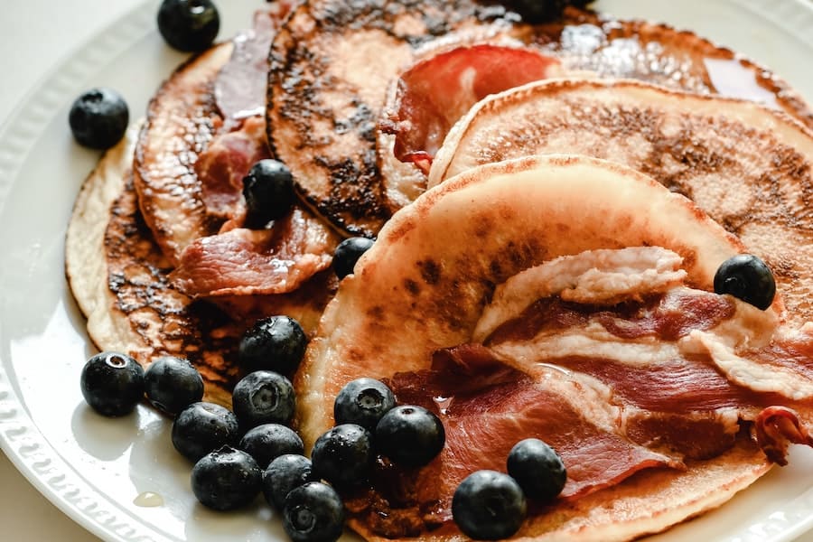 Pancakes with bacon and blueberries