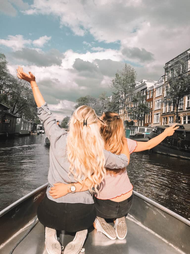 Two girls on a boat in Amsterdam