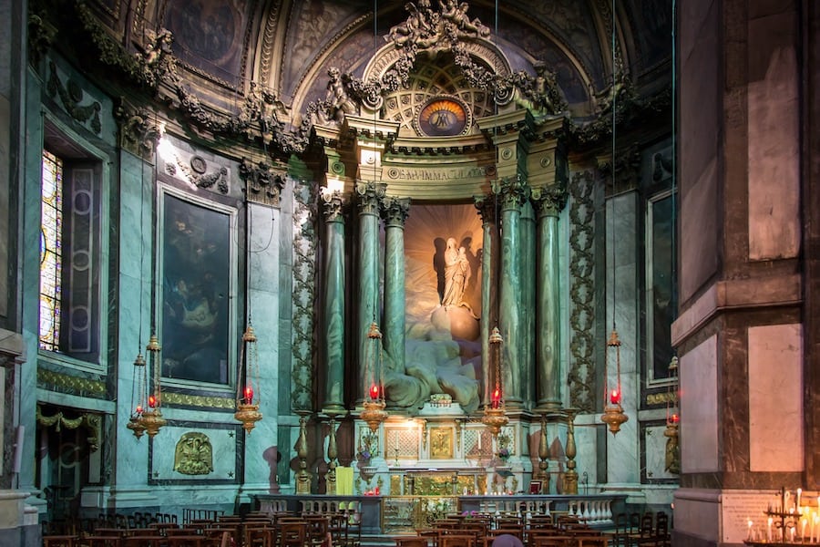 Dark church interior with stone detailing