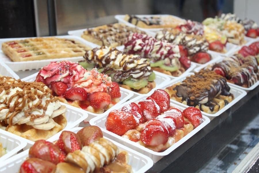 Rows of waffles with toppings