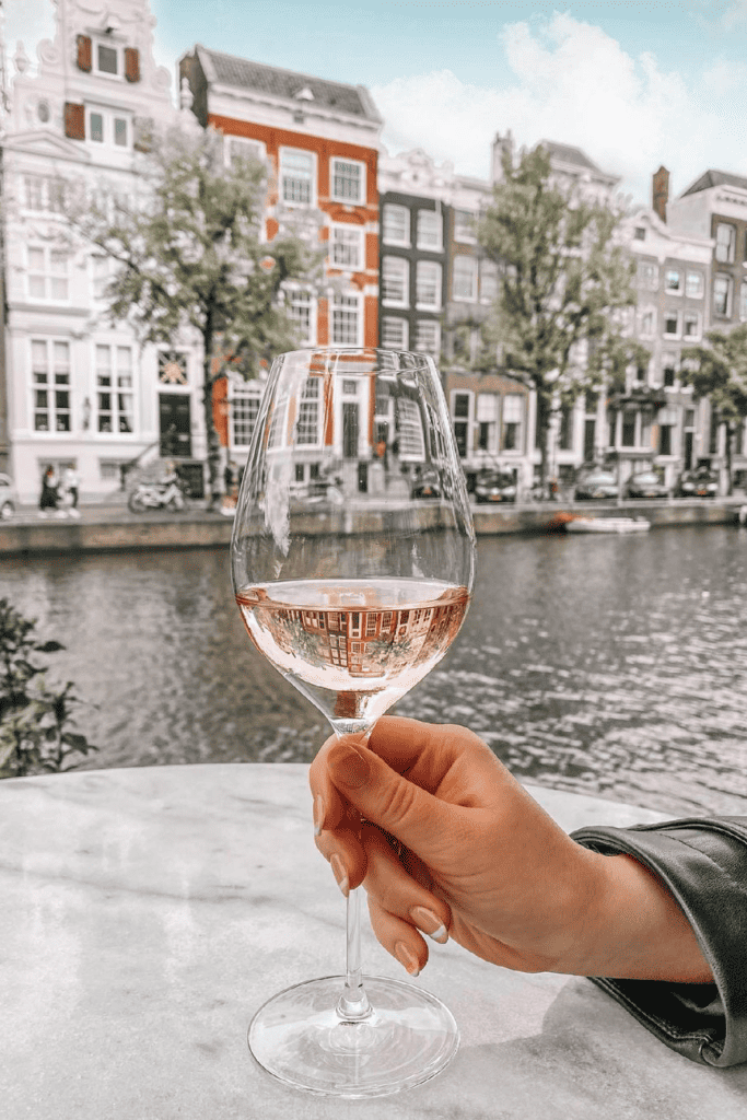 A glass of Rose along the canals of Amsterdam.