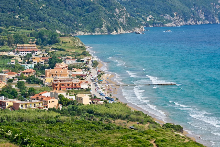 Typical bay with little town Arillas on Corfu, Greece