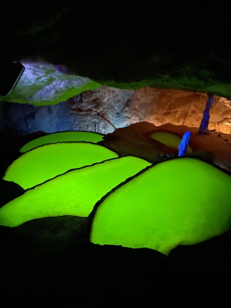 Glowing water in Can Marça Caves