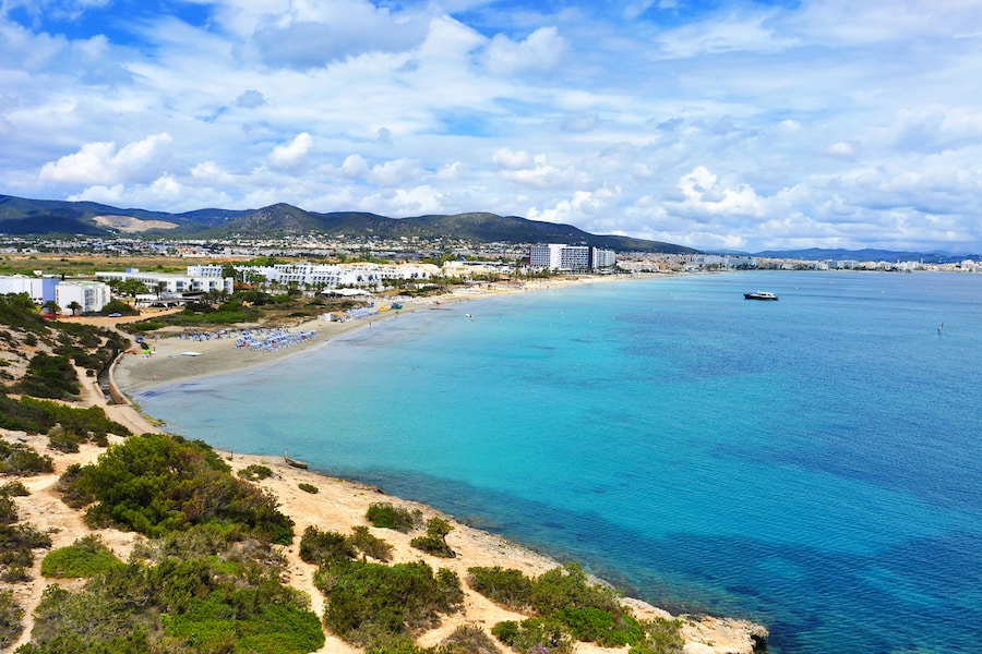 a panoramic view of the Platja den Bossa beach in Ibiza Town, in Ibiza Island, Balearic Islands, Spain