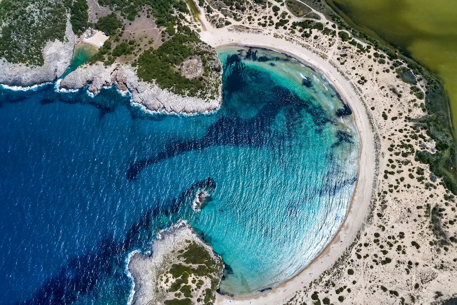 Panoramic aerial view of voidokilia beach, one of the best beaches in mediterranean Europe, beautiful lagoon of Voidokilia from a high point of view, Messinia, Greece