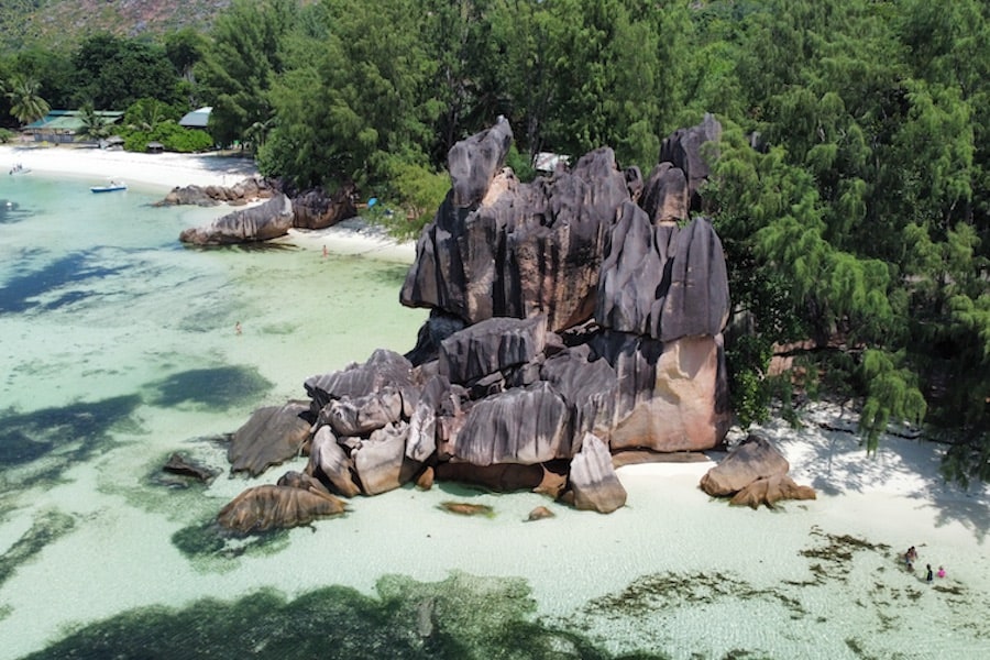Granite rocks surrounded by blue water