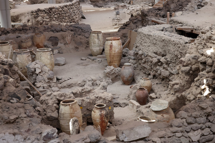 Santorini, Greece - July 01, 2021: Recovered ancient pottery in prehistoric town of Akrotiri, excavation site of a Minoan Bronze Age settlement on the Greek island of Santorini