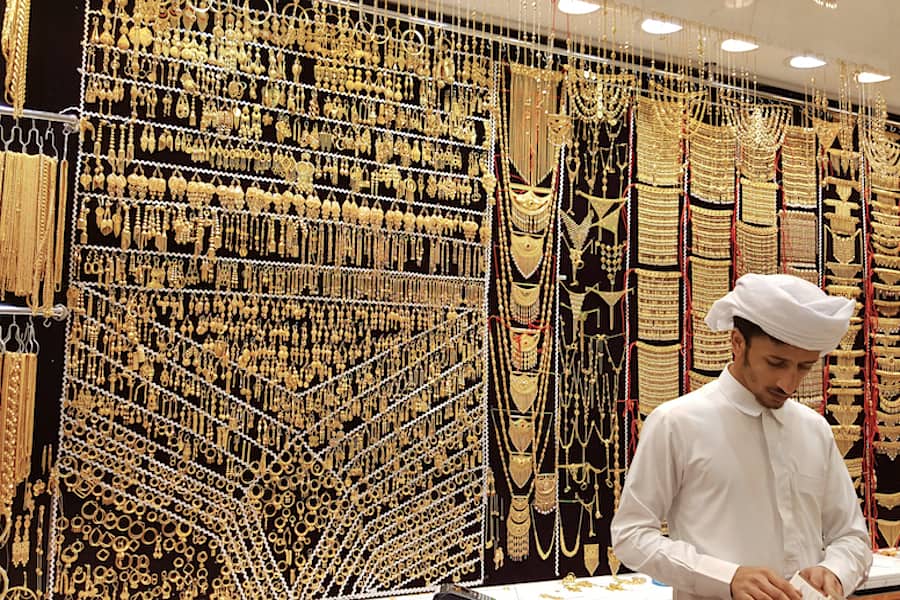 Gold on the famous "Golden souk" in Dubai Deira market on 9 February 2019, UAE. Deira is an old commercial center of Dubai with the biggest street market.