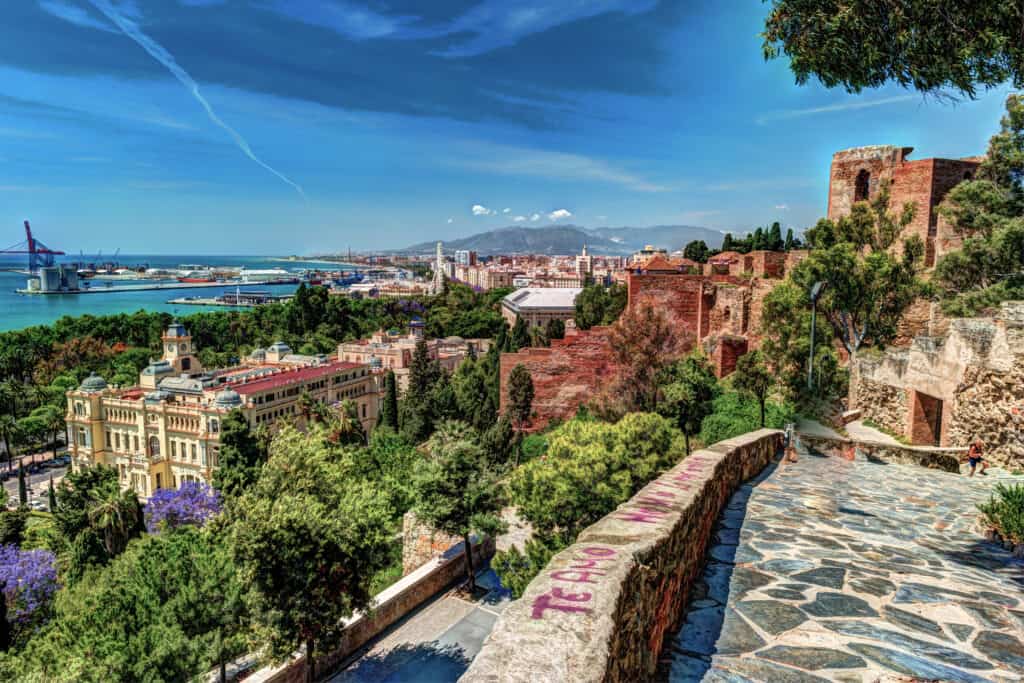 Aerial view of Malaga taken from Gibralfaro castle including port of Malaga, Alcazaba castle and the Cathedral, Andalucia, Spain.