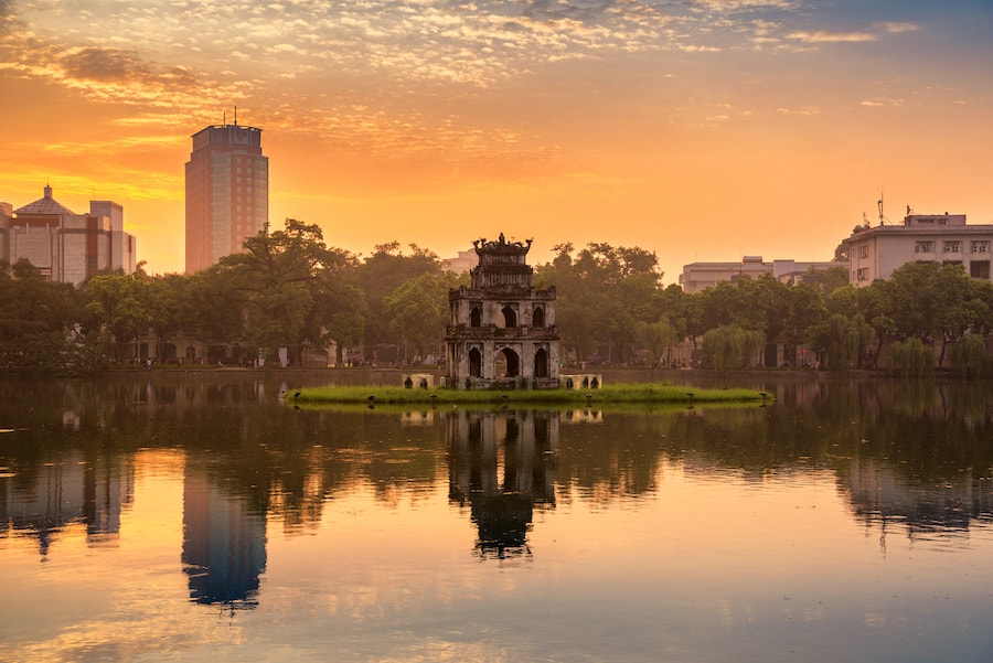 Hoan Kiem Lake (Lake of the Returned Sword) and the Turtle Tower in Hanoi , Vietnam