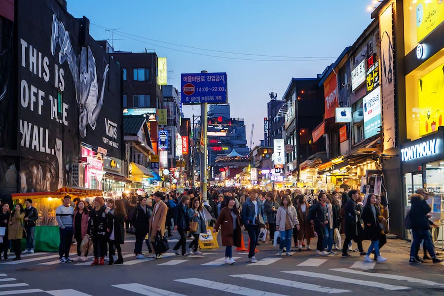 Group of people tourist are Shopping and walking at hongdae street market