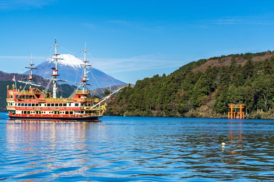 Mountain Fuji and Lake Ashi with Hakone temple and sightseeing boat in autumn