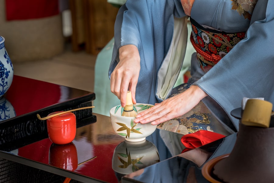 Japanese woman in kimono is preparing green tea which call the Japanese tea ceremony.