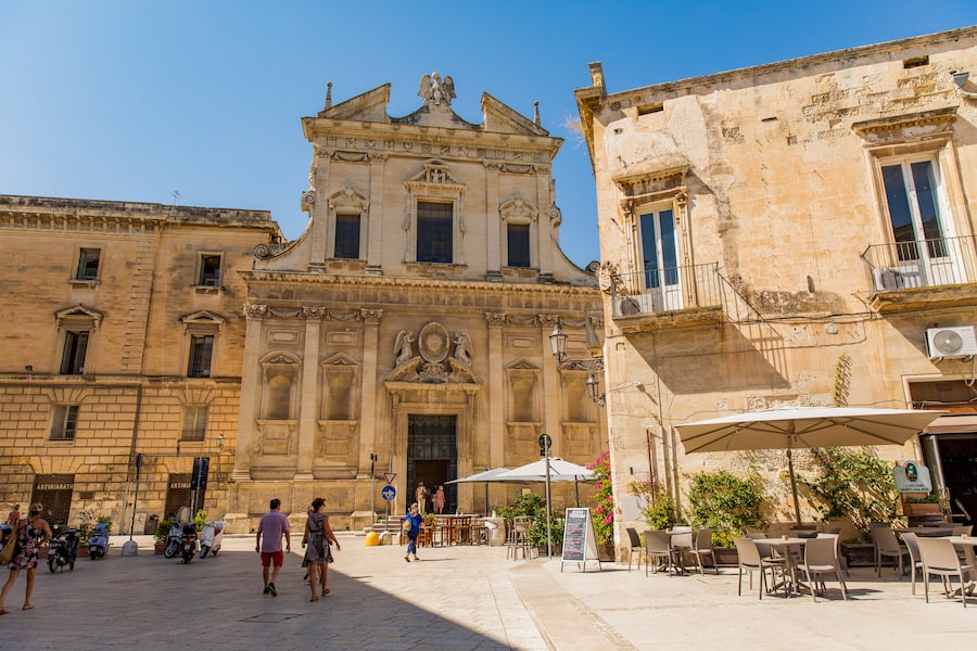 Square with beautiful buildings in the historical centre of Lecce, a big and populair city in Puglia (Italy)
