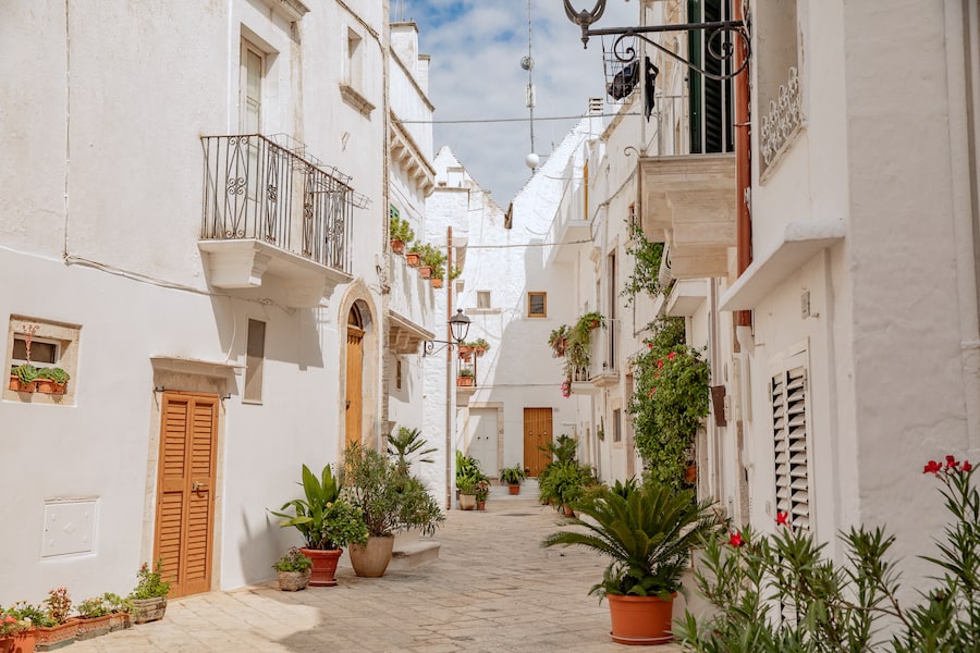 Street scene in Locorotondo, a charming white village in Puglia (Apulia, Italy)