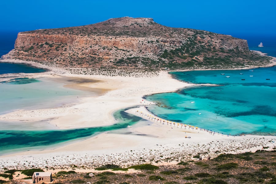 Fantastic panorama of Balos Lagoon and Gramvousa island on Crete, Greece. Cap tigani in the center