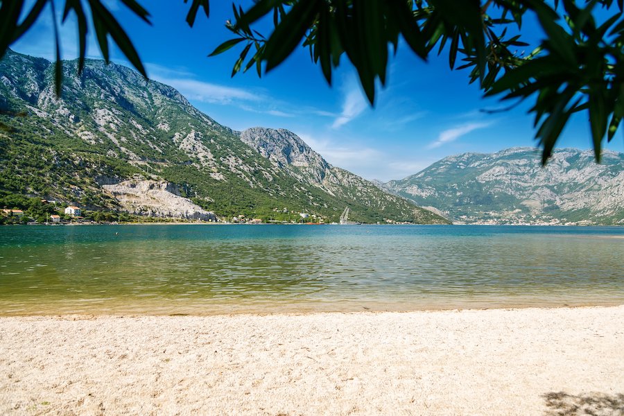 Small cozy beach in the village Morinj in the Kotor bay, Montenegro