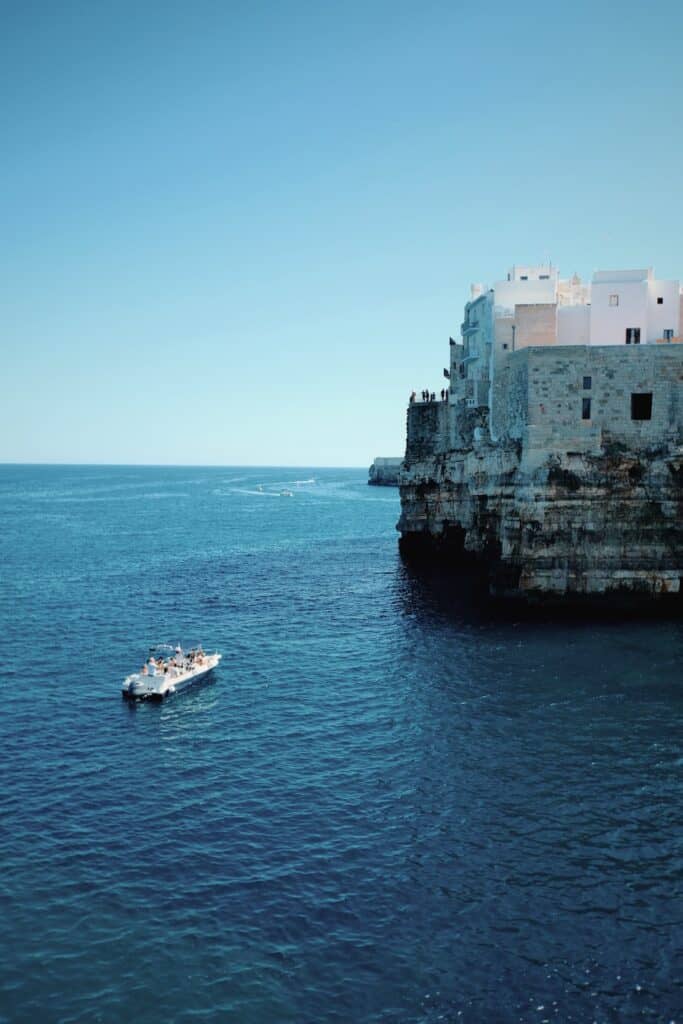 Boat on the water in Polignano a Mare