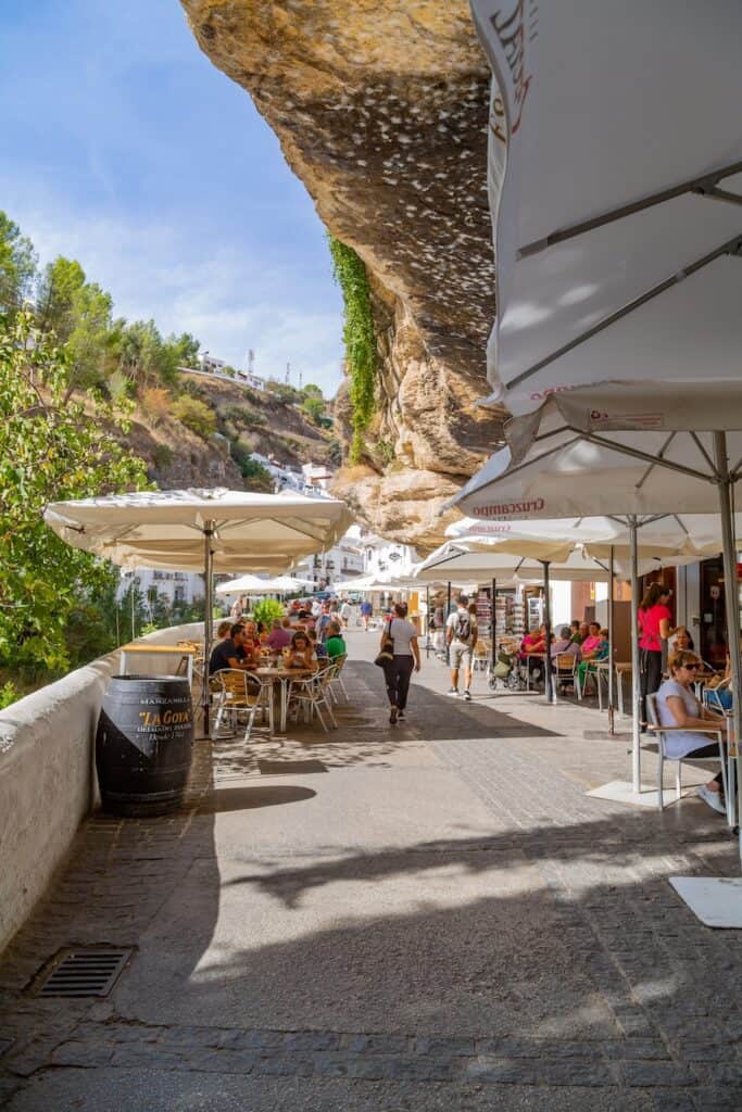 Setenil de las Bodegas, Spain: October 7, 2023: Picturesque town in the province of Cádiz. The houses of Setenil are built on the rock. Setenil de las Bodegas in Andalusia. Spain