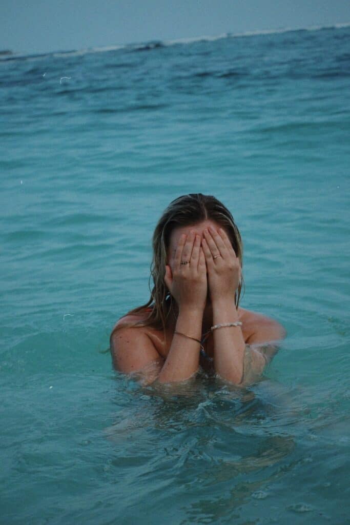 Girl swimming in the ocean 
