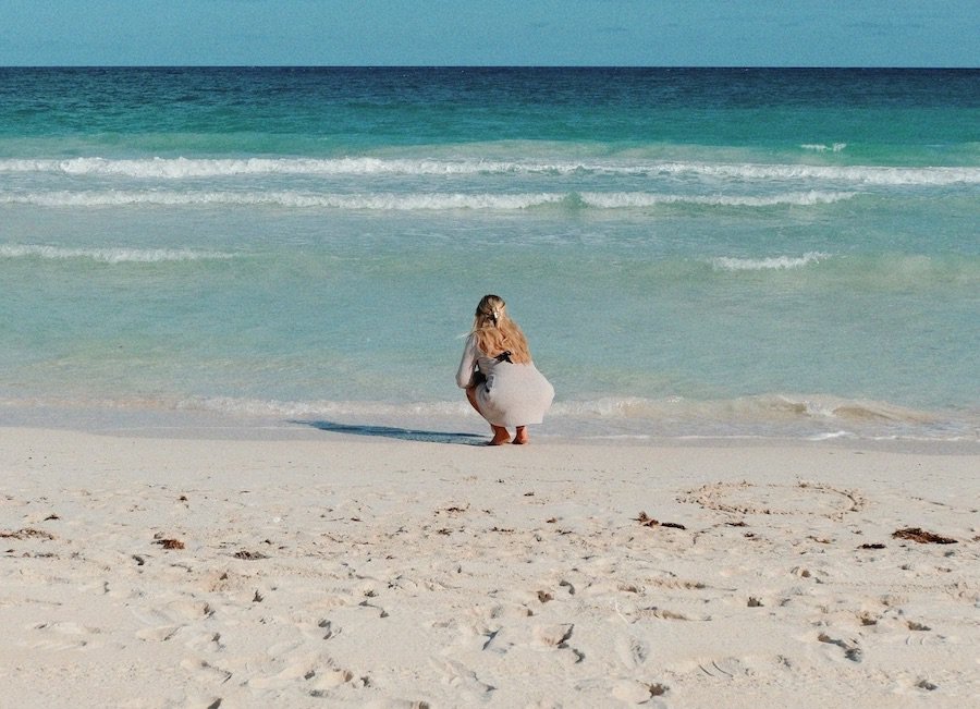 Girl on the beach in Tulum, Mexico