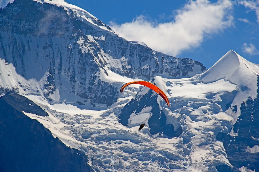 Paragliding in swiss alps Jungfrau region, Switzerland