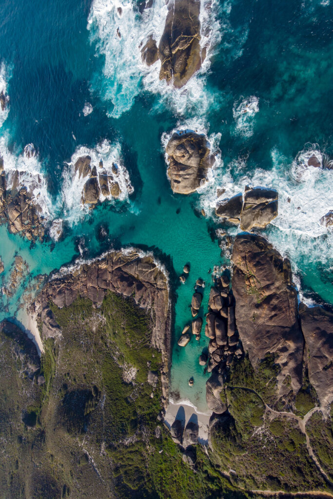 Aerial view of rocky coastline, Greens Pool Beach, crystal clear turquoise water of Great Southern Ocean, Denmark, Western Australia.
