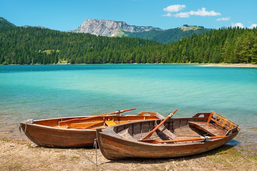 Boats on the shore of Black Lake (Crno Jezero) in Durmitor National Park. Zabljak, Montenegro